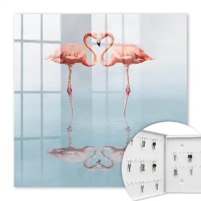 Flamingos lieben am Wasser