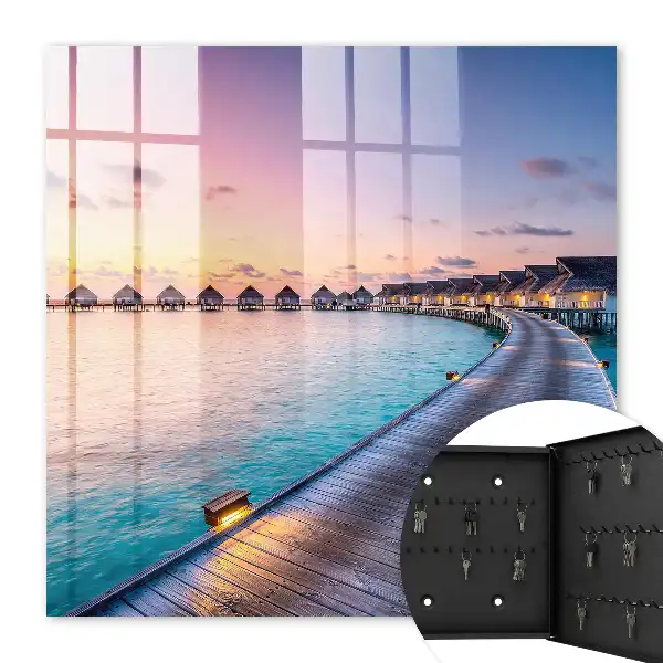 Ein friedlicher Sonnenuntergang mit Häusern am Wasser