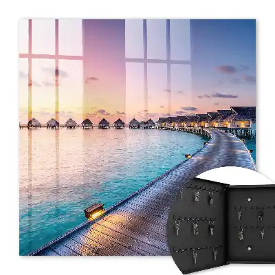 Ein friedlicher Sonnenuntergang mit Häusern am Wasser