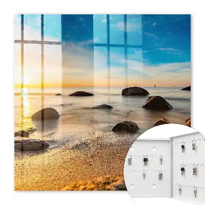Sonnenuntergang am Meer mit Meer und Steinen