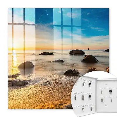 Sonnenuntergang am Meer mit Meer und Steinen