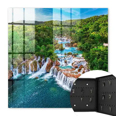Wandbild mit natürlichen Wasserfällen und üppigem Grün