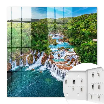 Wandbild mit natürlichen Wasserfällen und üppigem Grün