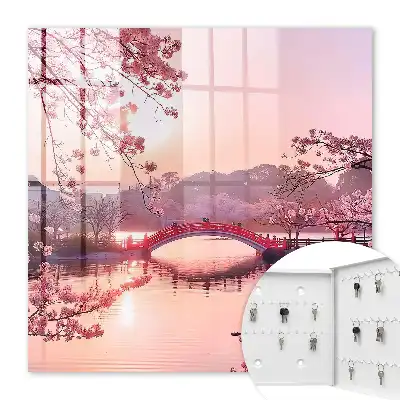 Frühlingsbrücke mit Kirschbäumen und Sonne
