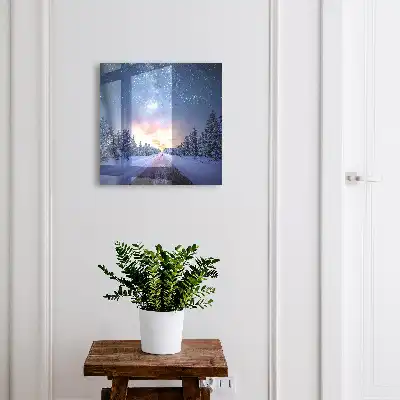 Sterne über der Straße im Winterwald