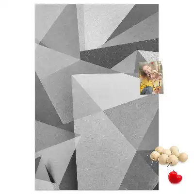 Pinnwand aus Kork mit geometrischer Komposition