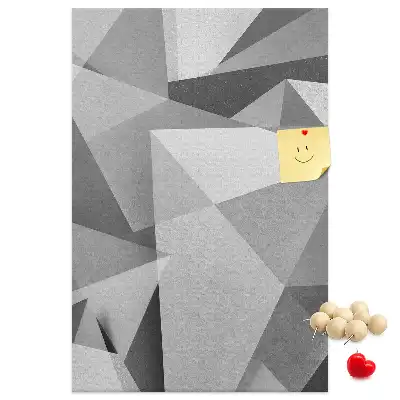 Pinnwand aus Kork mit geometrischer Komposition