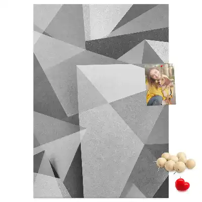 Pinnwand aus Kork mit geometrischer Komposition
