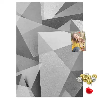 Pinnwand aus Kork mit geometrischer Komposition