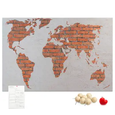 Korktafel mit Weltkarten Motiv auf Ziegelhintergrund