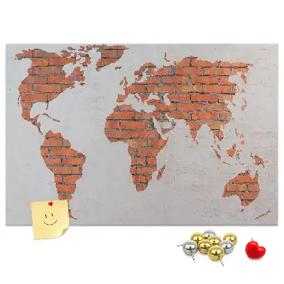 Korktafel mit Weltkarten Motiv auf Ziegelhintergrund