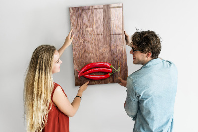 Magnettafel mit Marker Paprika auf einem Brett