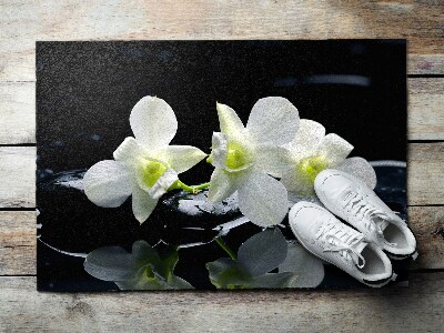 Fußmatte vor der Tür im Freien Orchideen