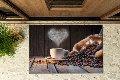 Fußmatte vor der Tür außen Kaffeetasse