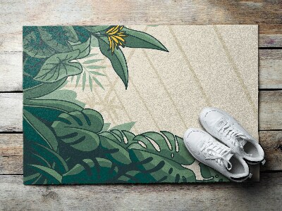 Fußabtreter vor der Tür im Freien Monstera-Blume